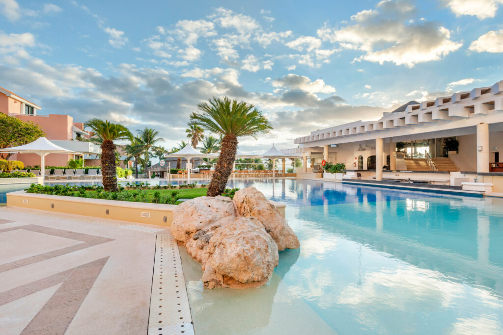 Tropical pool area hotel photography.