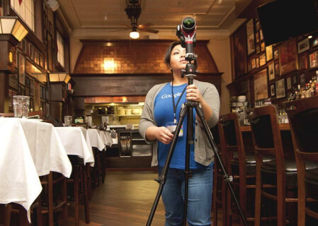 Google Street View Tours being shot by woman inside of a restaurant/bar.